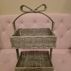 Two-Tiered Woven Wiker Tray Stand in Light Taupe With Coquette Bow Handle